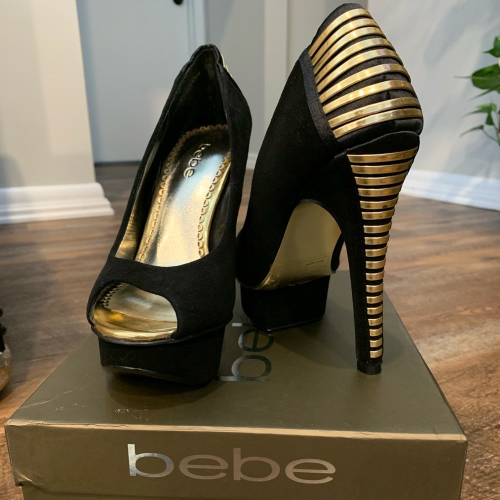 Never worn Bebe sienna heels in size 7.